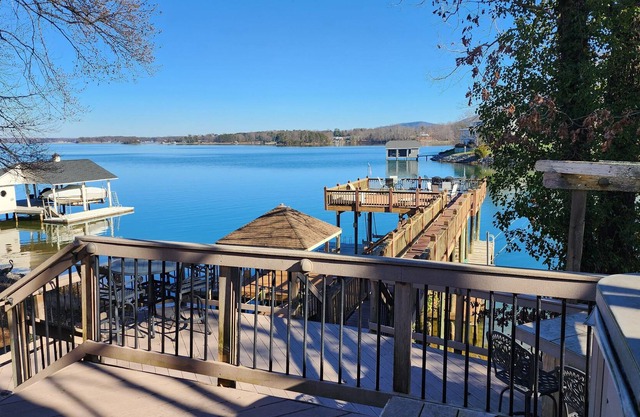 Stunning lake front with private dock and pontoon boat available for rent