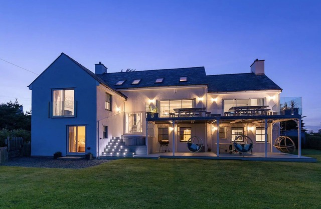 Stunning luxury stay, with hot tub, tennis court and sea views. Sleeping 16-18.