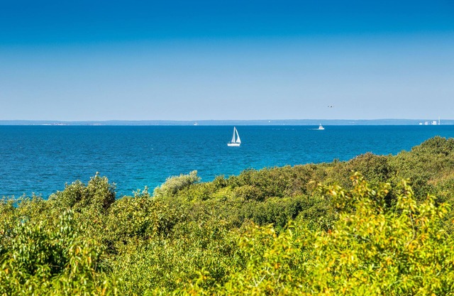 Stunning, private two acre bayfront property on Culloden Point.