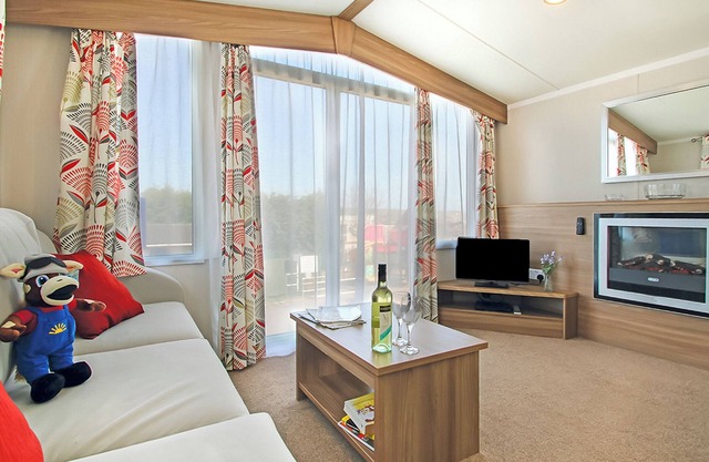 Stylish 12ft-wide caravan with one double and two twin.