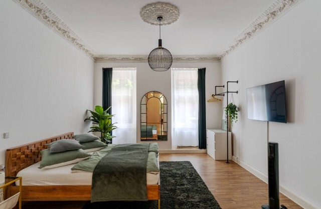 Stylish old building apartment designed by Bevo
