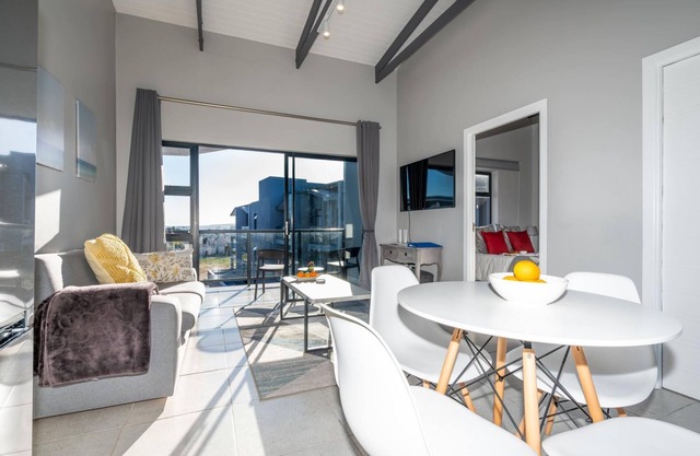 Stylish Urban Stay | Balcony | Lagoon View