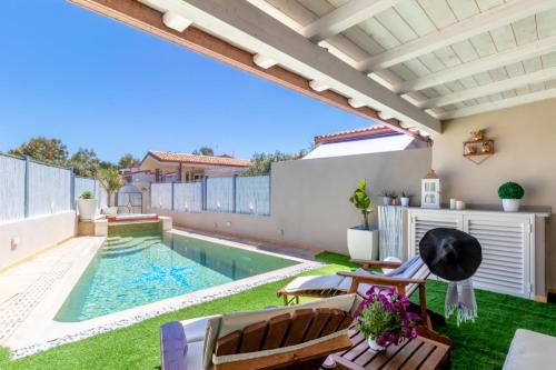 SUNSET BAY POOL VILLA SARDINIA with private heated pool, jacuzzi, counter-current swimming