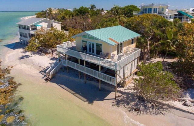 Sunset Beach House: Pet Friendly Beach Front Home with Gorgeous Shaded Deck