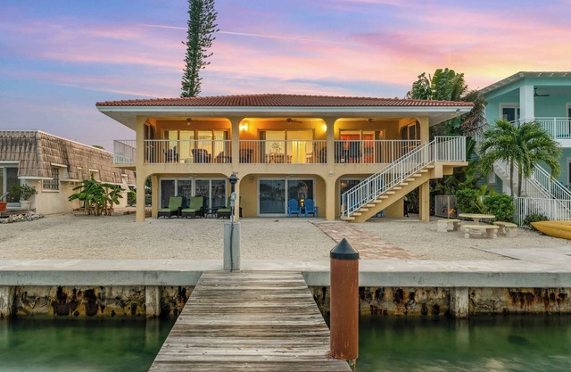 Sunset Harbor Waterfront Villa with Dock, Cabana Club