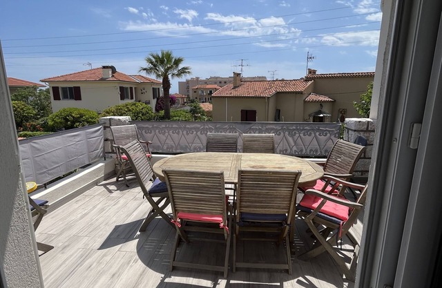 Superb upstairs villa with private garden and parking.