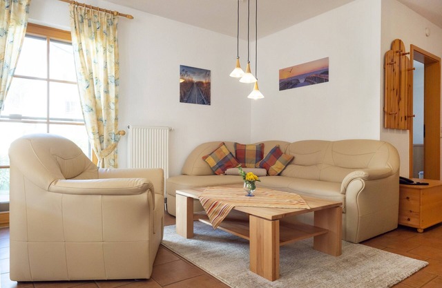 Terraced house in Zingst with terrace, garden view and heated indoor pool