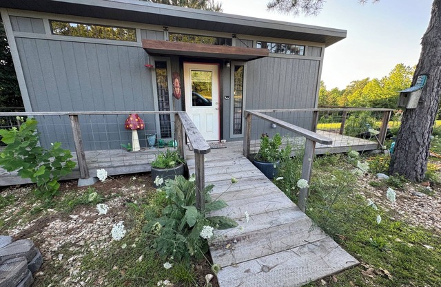 The Adventure Center rustic tiny cabin hot tub access stage stars sunsets & pets