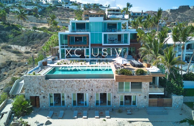 This 40,000sq. ft. beachfront villa offers unmatched elegance and privacy, with 11 bedrooms and