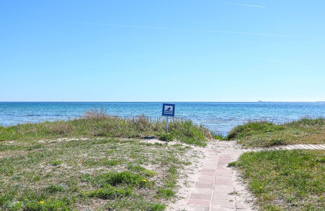 This bright and modern cottage is located near the sea, 200 meters from the sandy beach.