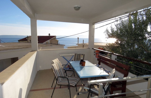 Three bedroom apartment with terrace and sea view Drašnice, Makarska (A-5265-b)