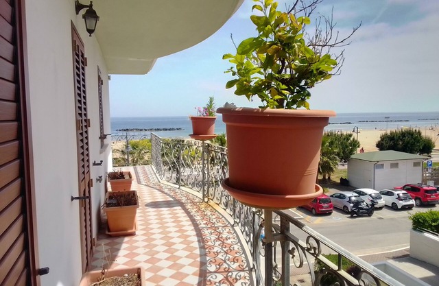 Three-room seaside apartment with front and side sea view terrace