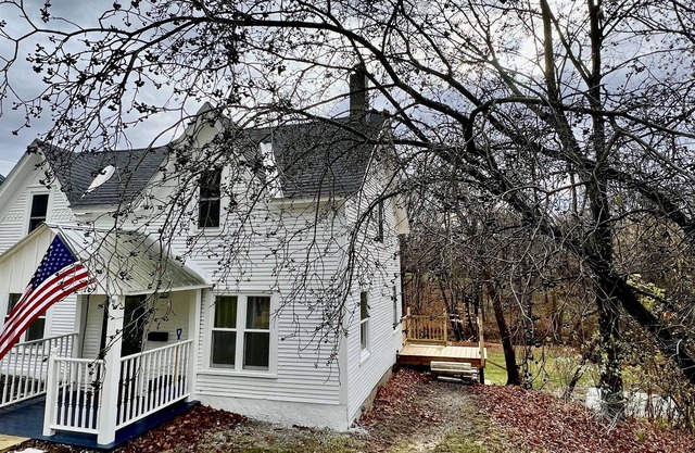 Totally renovated, in town home directly on the Neshobe River!