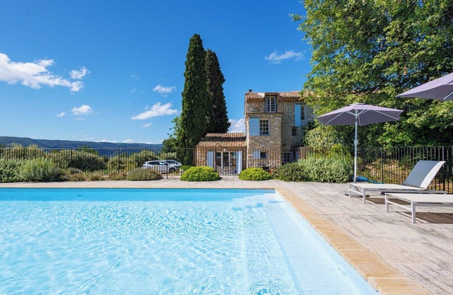 Traditional Provencal farmhouse with pool set among vines and olives