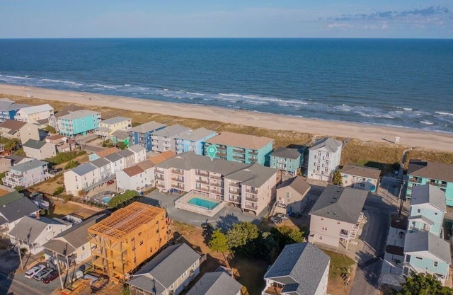 Tranquil beach getaway just steps from the sand!