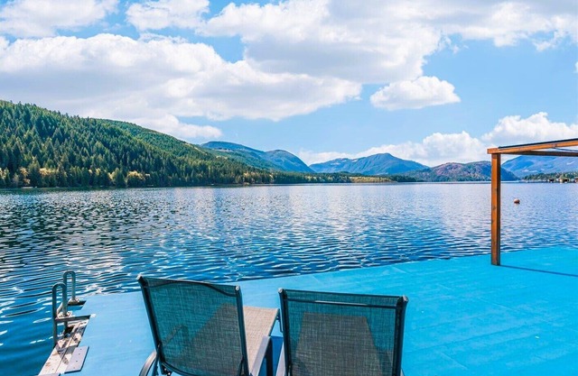 Tranquilize at Spectacular Sproat Lakefront Waterfront Authentic Timber Log Home