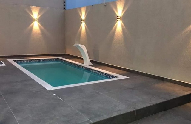 Triplex house with pool and games room