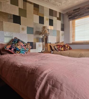 Twin room at Fir Tree Lodge with garden view