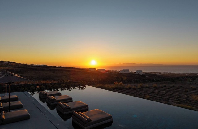 Ulta Luxury villa at Oia with massive pool area and extra large interiors