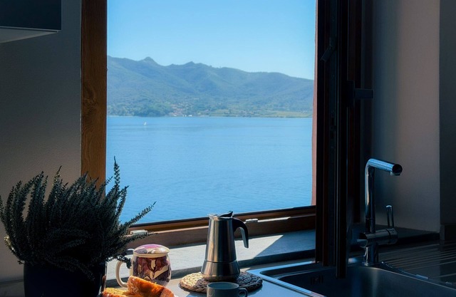 Unique apartment is located on the second floor and consists of a living room with a kitchen corner,