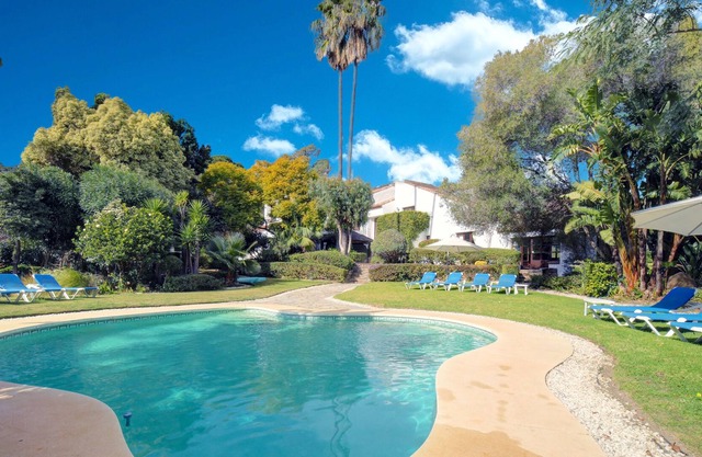 Unique estate located in an enormous fenced plot with 3 properties. All private