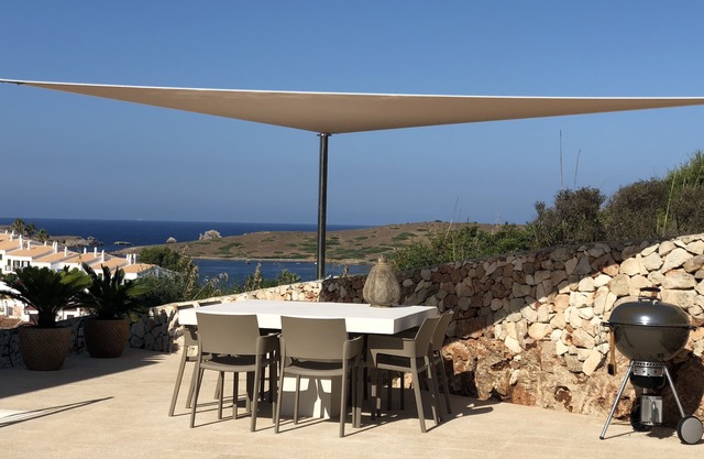 Unique location with panoramic view of the port of Addaia from every room.