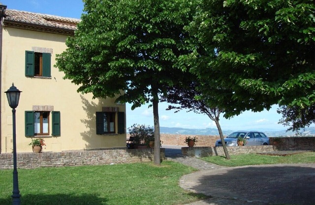 Uniquely situated, stunning, medieval village home with gorgeous panorama view