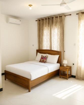 Uroa Escape Zanzibar - Beachfront 2BR Condo with Terrace, AC & WiFi