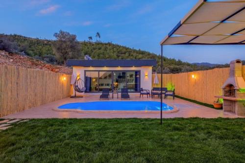 Villa Apiko / Fethiye Yeşilüzümlü