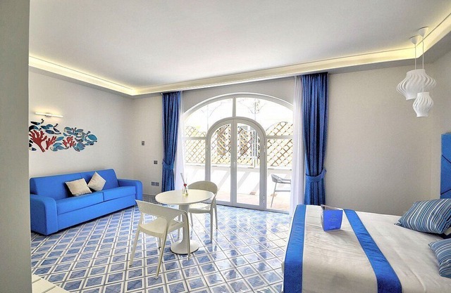 Villa Clarice D, fully refundable with voucher*: An elegant and modern studio apartment in a quiet position, located on a hillside above the sea, with Free WI-FI.