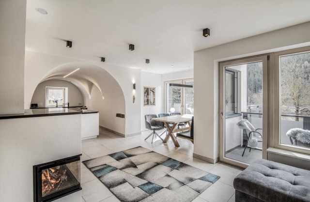 Villa Tribulaunblick – Exclusive apartment with fireplace, terrace & panorama