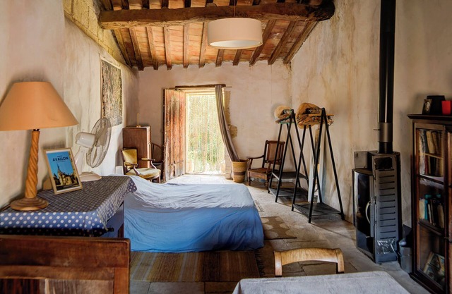 Village house in its original state (under the bell tower)