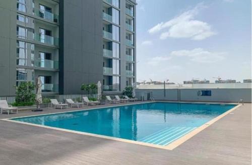 Vogue Elegant Sobha Hartland one bedroom Apartment with kids room, near Downtown with Pool & Gym Access