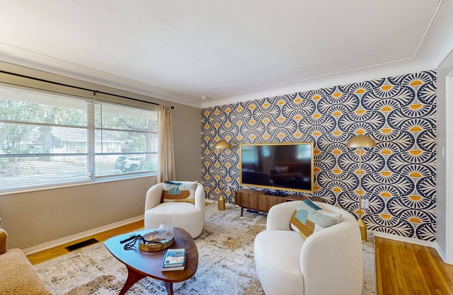 Walk to downtown at this charming home with bikes, wifi, and cornhole