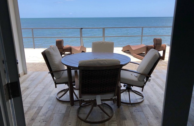 Walk to the beach from your beachfront 2 bedroom villa, sleeps 5