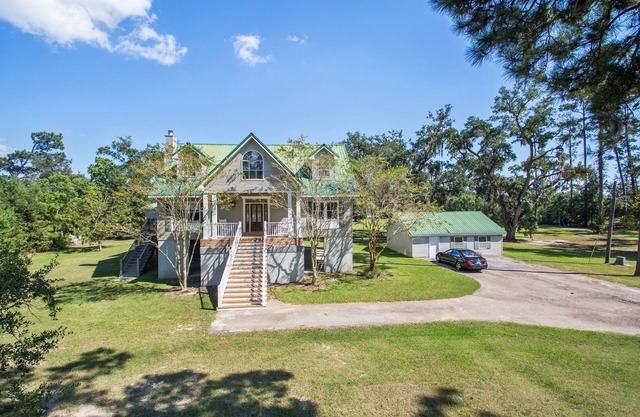 Waterfront Gated Estate on 8 secluded acres!