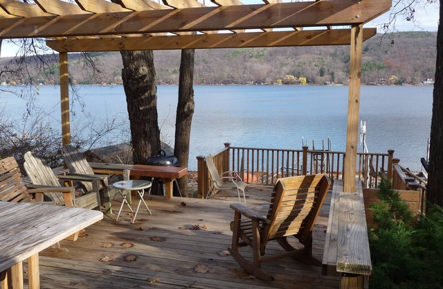 Waterfront home with spectacular views and level pebble beach.