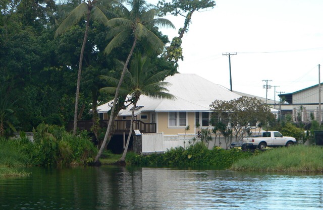 Waterfront in heart of Hilo, 1 block to hotels. Built on pond w/fish & turtles.