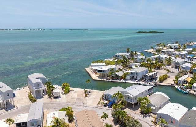 Waterfront RV Lot Just 2 Spots from Open Water with 35' Seawall—Fish, Boat & Relax in Paradise!