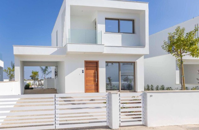 Welcome to this stunning, modern villa, which sits within an exclusive gated complex surrounded by f