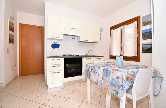 Well-finished studio apartment with A/C wifi and veranda