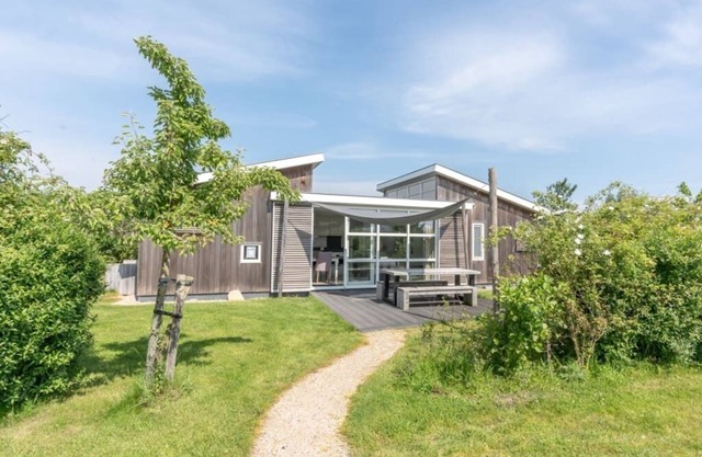 You are guaranteed to unwind and relax in one of the chairs or on the comfy sofa in the central livi