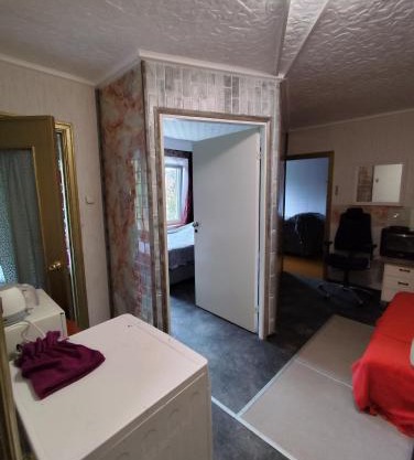 your room in a three-room apartment with a shared kitchen, bathroom, and toilet