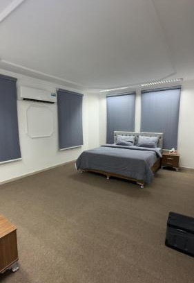 Muscat House | غرف فندقية راقية في شارع الموج - موقع مميز