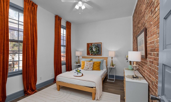 Olde Town Augusta Apartment | 1 bedroom, 1 bathroom suite in Downtown Augusta. The sleeping arrangements for this unit are a full size bed and a pull-out couch in the living room.