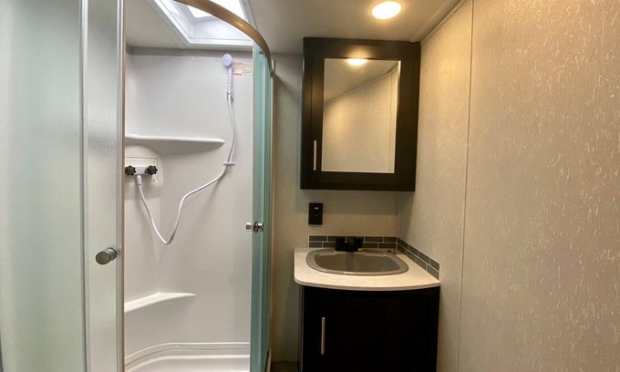 Medford House | 2 separate RV’s with queen-sized beds, dining area, and full kitchen.