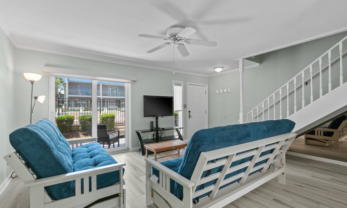 Miramar Beach House | 2-story townhouse with 2 balconies & patios, pool access, fast WiFi, AC