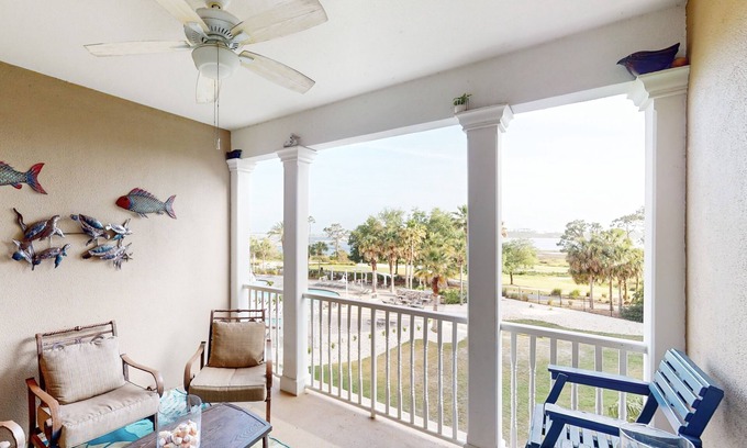 Upper Grand Lagoon Condo | 3rd-floor beach & pool-view condo with outdoor pool, hot tub, grills, balcony