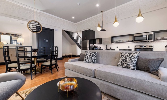 Central Business District Hotel | 4BR 2-Story Historic Space Steps from French Quarter | The Mayfair