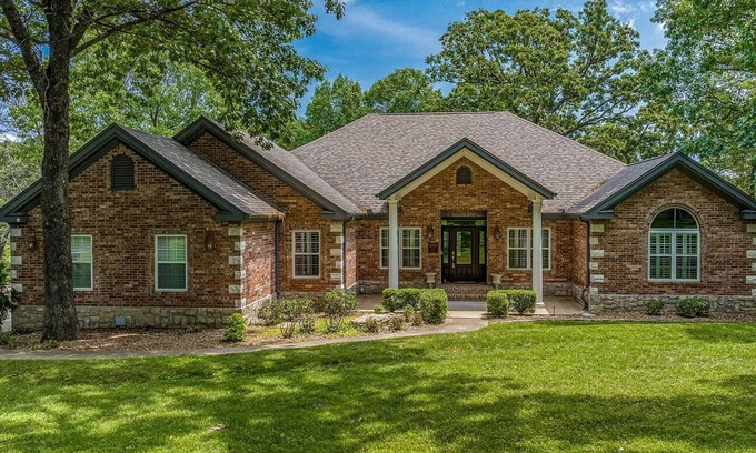 Grove House | 5-Bedrooms on the water! 2 Kitchens, Hot Tub, and Theatre!